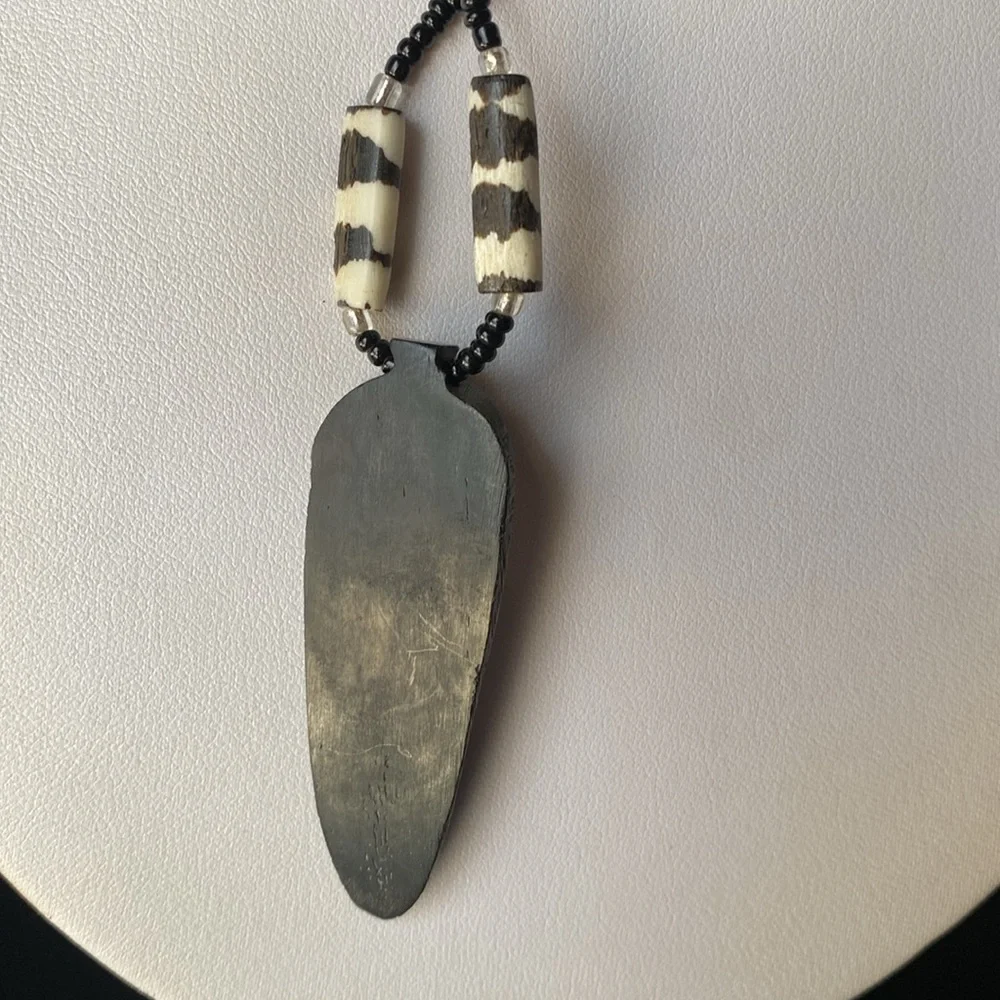 Black and Cream Beaded Necklace with Mask Pendant